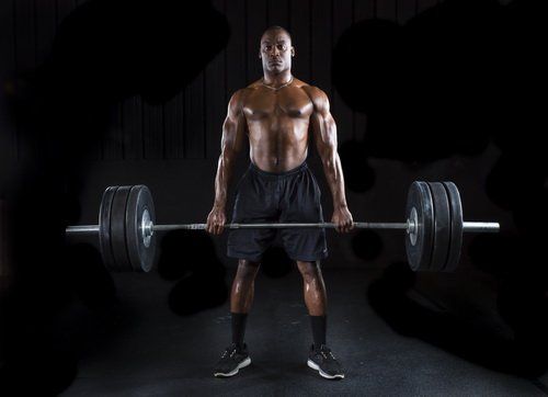 Athlete Lifts Weights